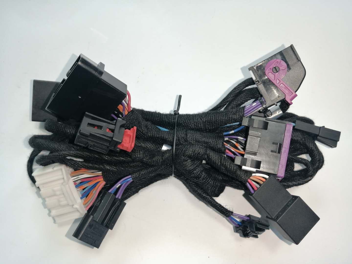 Automotive main wiring harness with integrated fuse box and multi-pin connectors