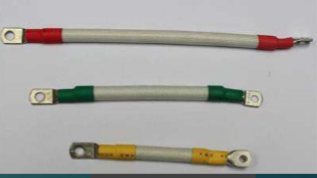 Ground strap with dual ring terminals